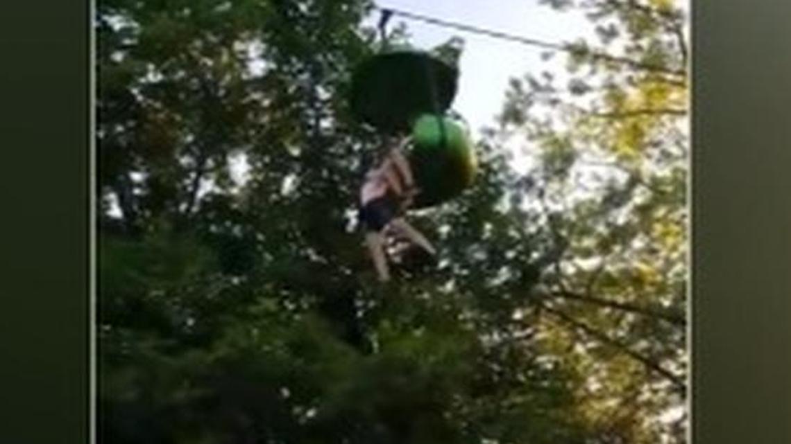 A teenager fell out of the gondola ride at Six Flags Amusement Park in upstate New York on Saturday, June 25, 2017. She was caught be the crowd below.