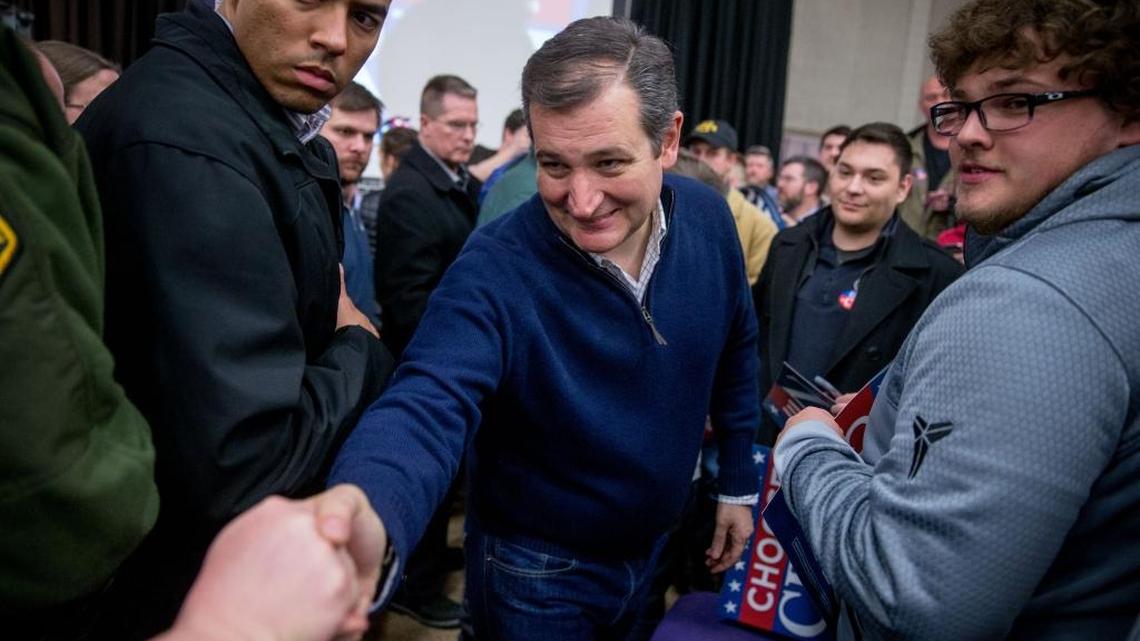 Republican presidential candidate Sen. Ted Cruz, R-Texas, greets a member of the audience after speaking at a rally at the Five Sullivan Brothers Convention Center in Waterloo, Iowa, Saturday, Jan. 23, 2016.