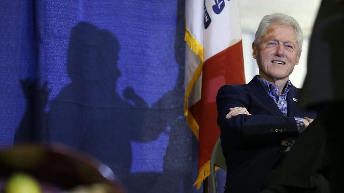 Former President Bill Clinton listens as his wife, Democratic presidential candidate Hillary Clinton, speaks in Ames, Iowa in November 2015. During recent campaign swings through Iowa and New Hampshire, Bill Clinton treaded fastidiously through tightly controlled campaign events at which he walked voters through Hillary Clinton’s policy priorities, stressing the need to invest in infrastructure, renewable energy, small business, college affordability and paid leave. He also sprinkled his remarks with his wife’s foreign policy and domestic accomplishments as first lady, New York senator and secretary of state.