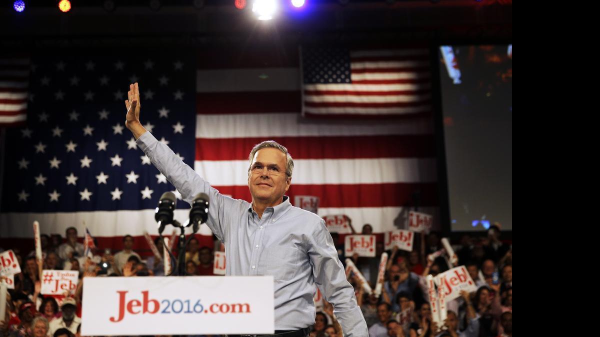 
Former Florida Gov. Jeb Bush waves as he takes the stage as he formally announced he is joining the race for president with a speech, Monday, June 15, 2015, at Miami Dade College in Miami.
