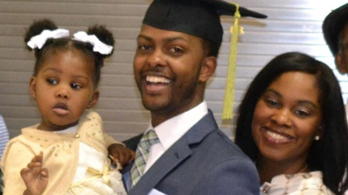 Kevin Morton with wife Sherry and daughter Sahara at medical school graduation.