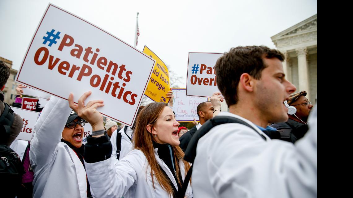 
In this March 4, 2015, file photo, demonstrators chant during health care rally outside the Supreme Court in Washington. 
