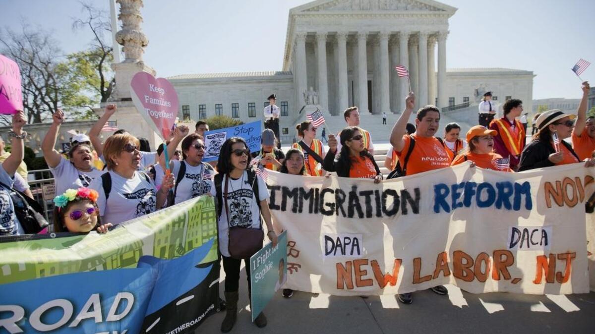 Supporters of immigration revisions gather in front of the Supreme Court in Washington on April 18, 2016.