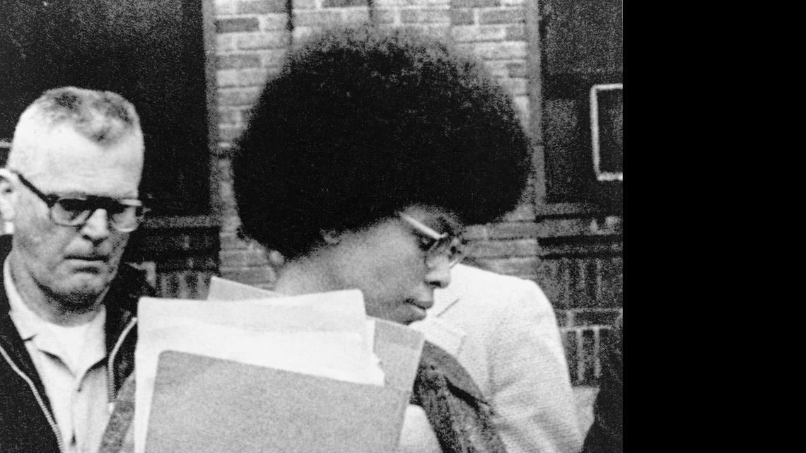 
Joanne Chesimard, a member of the Black Panther Party and Black Liberation Army, leaves Middlesex County courthouse in New Brunswick, N.J., on April 25, 1977. Chesimard was granted asylum in Cuba after her 1979 escape from the New Jersey prison where the former Black Panther was serving a life sentence in the killing of a New Jersey state trooper. She remains there to this day.
