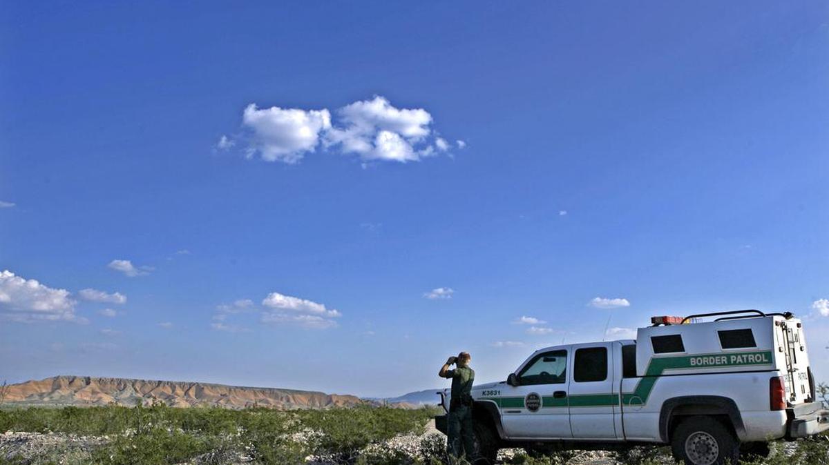 U.S. Border Patrol agent Brecht Merrill, 23, stands guard outside of Presidio, Texas in this file photo. It was in this region that two young women from Guatemala crossed into America to try to get to Fresno to reconnect with their mother, who they had not seen for 10 years. They now allege a Border Patrol officer sexually assaulted them during their detention.