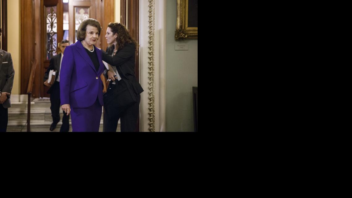 
Senate Intelligence Committee Chair Sen. Dianne Feinstein, D-Calif. leaves the Senate floor on Capitol Hill in Washington, Tuesday, Dec. 9, 2014, after releasing a report on the CIA's harsh interrogation techniques at secret overseas facilities after the 9/11 terror attacks. Feinstein branded the findings a "stain on the nation's history."
