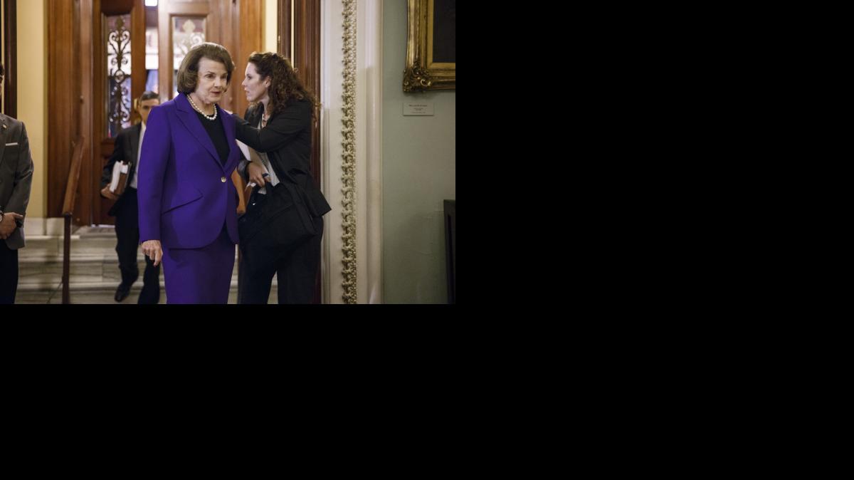 
Senate Intelligence Committee Chair Sen. Dianne Feinstein, D-Calif. leaves the Senate floor on Capitol Hill in Washington, Tuesday, Dec. 9, 2014, after releasing a report on the CIA's harsh interrogation techniques at secret overseas facilities after the 9/11 terror attacks. Feinstein branded the findings a "stain on the nation's history."
