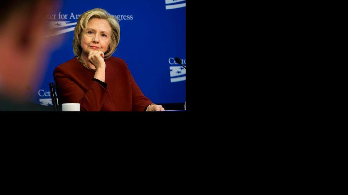 
In this photo taken March 23, 2015, former Secretary of State Hillary Rodham Clinton listens during an event hosted by the Center for American Progress (CAP) and the America Federation of State, County and Municipal Employees (AFSCME), in Washington. 
