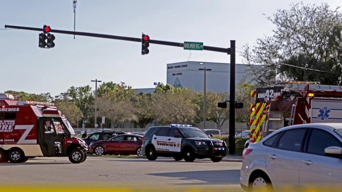Police and fire rescue vehicles converge on Stoneman Douglas High School in Parkland after reports of an active shooter Wednesday, Feb. 14, 2018.