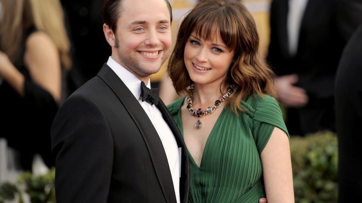 This Jan. 27, 2013 file photo shows actors Vincent Kartheiser, left, and Alexis Bledel at the 19th Annual Screen Actors Guild Awards at the Shrine Auditorium in Los Angeles. Bledel's publicist had just confirmed the news that the couple was engaged. (Photo by Chris Pizzello/Invision/AP, file)