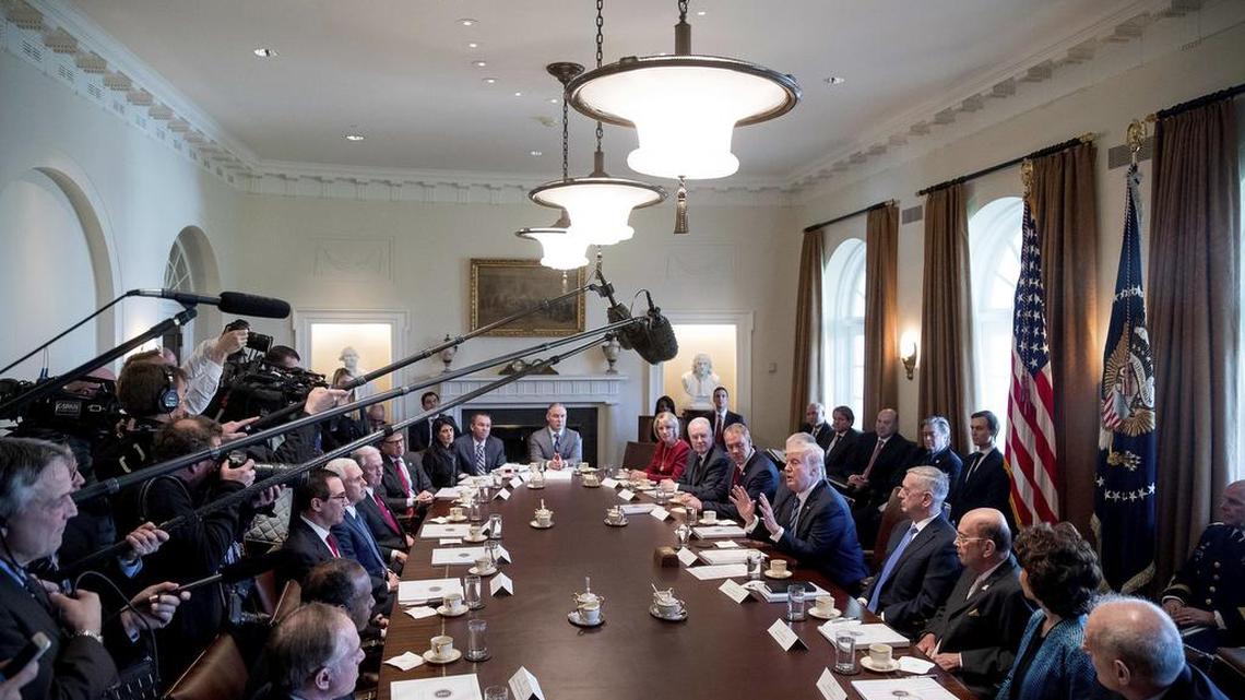President Donald Trump speaks during a meeting with his Cabinet in the Cabinet Room of the White House in Washington, Monday, March 13, 2017. Clockwise, from lower left are, Veterans Affairs Secretary David Shulkin, Housing and Urban Development Secretary Ben Carson, Treasury Secretary Steve Mnuchin, Vice President Mike Pence, Attorney General Jeff Sessions, Energy Secretary Rick Perry, UN Ambassador Nikki Haley, Budget Director Mick Mulvaney, EPA Administrator Scott Pruitt, Education Secretary Betsy DeVos, Health and Human Services Secretary Tom Price, Interior Secretary Ryan Zinke, Secretary of State Rex Tillerson, the president, Defense Secretary Jim Mattis, Commerce Secretary Wilbur Ross, Transportation Secretary Elaine Chao and Homeland Security Secretary John Kelly.