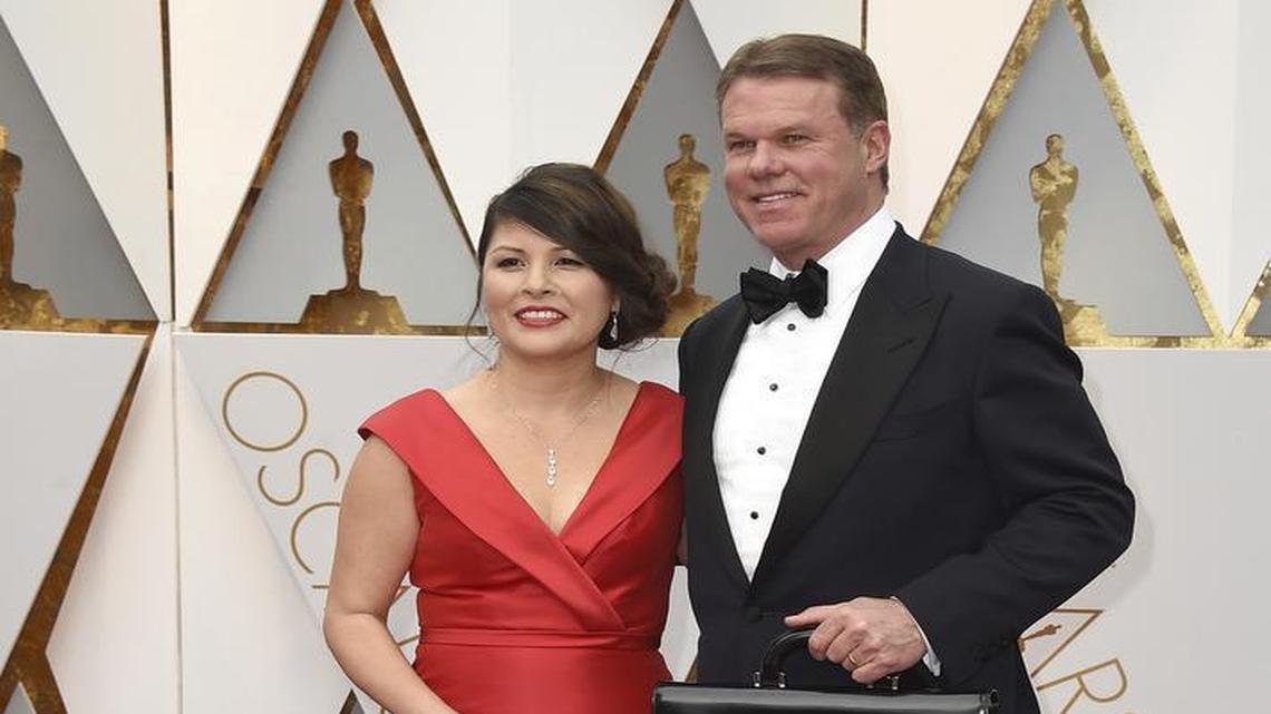Martha L. Ruiz, left, and Brian Cullinan from PricewaterhouseCoopers arrive at the Oscars on Sunday, Feb. 26, 2017, at the Dolby Theatre in Los Angeles.