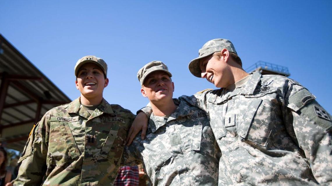 U.S. Army Capt. Kristen Griest, left, Maj. Lisa Jaster, center, and 1st Lt. Shaye Haver pose together after an Army Ranger School graduation ceremony, Oct. 16, 2015, in Fort Benning, Ga.