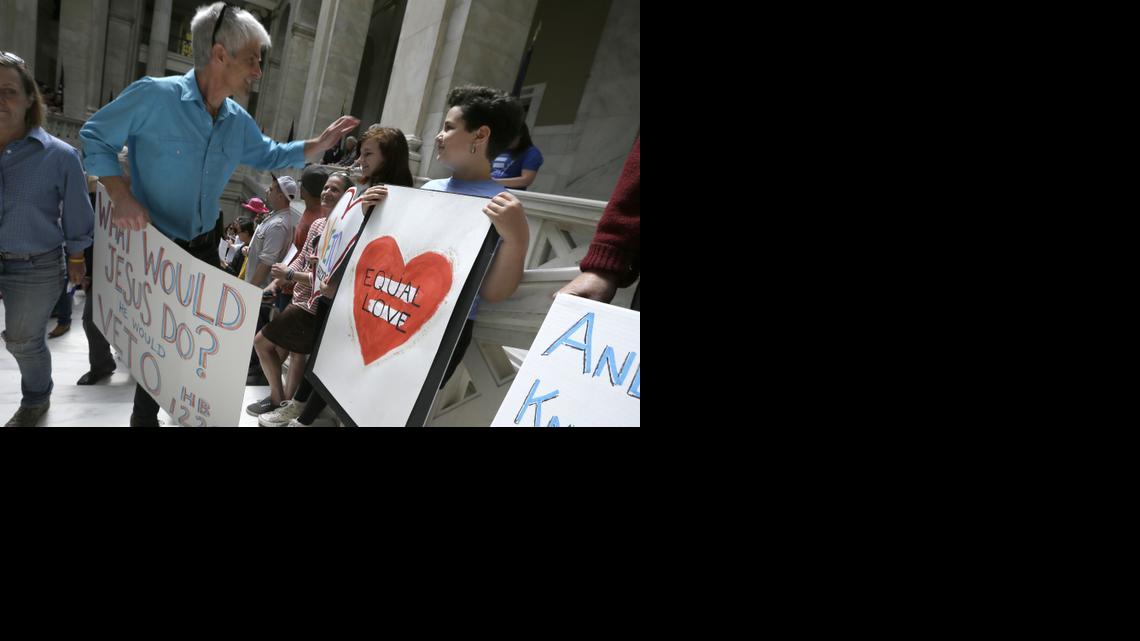 
Protesters gather on the steps near the House chamber at the Arkansas state Capitol in Little Rock, Ark., Monday, March 30, 2015. A House committee earlier Monday advanced an amended version of a bill that opponents say allows discrimination against gays and lesbians. 
