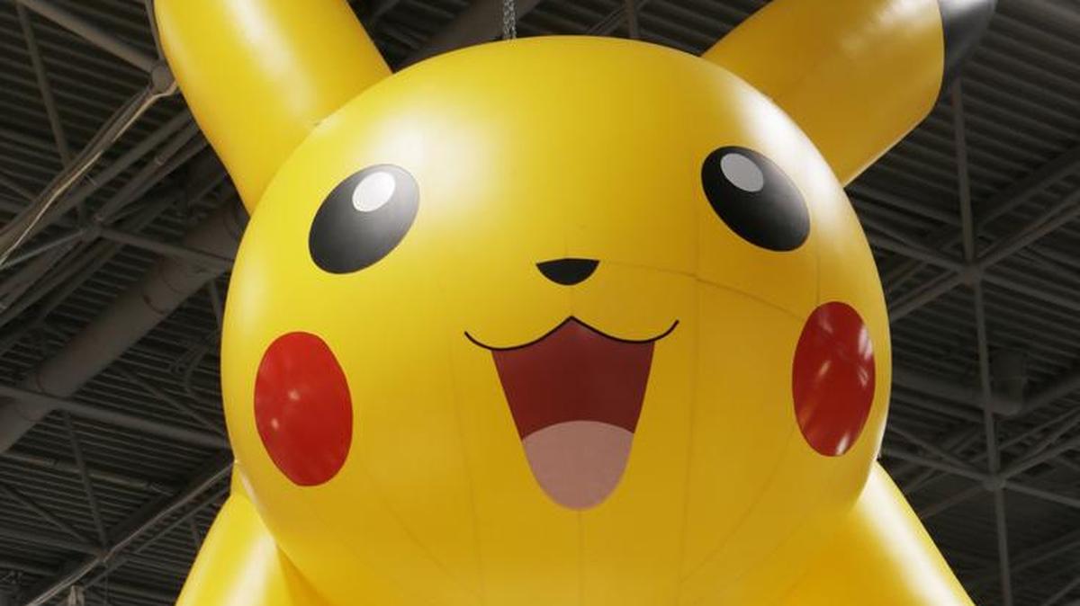 A Pikachu of Pokemon display hanging above Toy Fair 2014 at the Jacob K. Javits Convention Center in New York. Curtis Combs, of Somerset, Ky., tried to scale a White House fence on Tuesday while dressed as Pikachu, authorities said.
