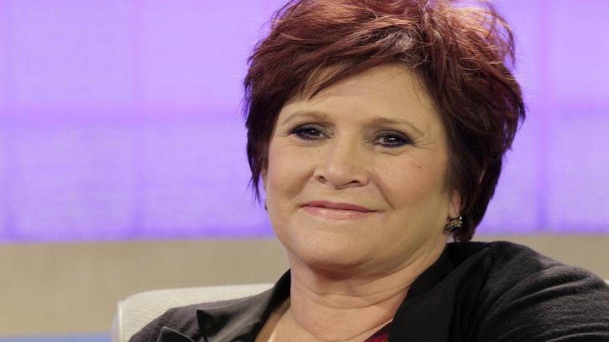 In this Tuesday, Sept. 29, 2009 file photo, actress and writer Carrie Fisher appears on the NBC “Today” television program in New York to discuss “Wishful Drinking,” her autobiographical solo show on Broadway. On Tuesday, Dec. 27, 2016, a publicist said Fisher has died at the age of 60.