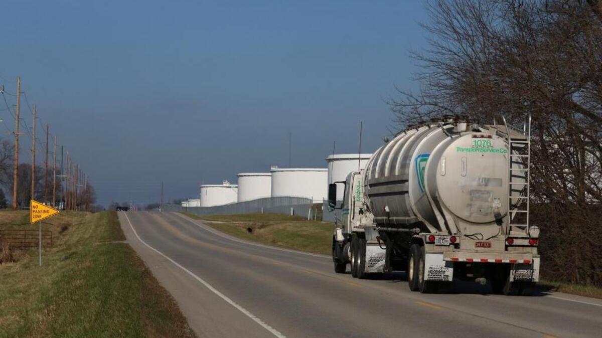 A tanker truck passes the oil storage tanks at Patoka, Illinois, in December 2015. The small town in southern Illinois would be the southern terminus of the Dakota Access Pipeline, if it is completed.