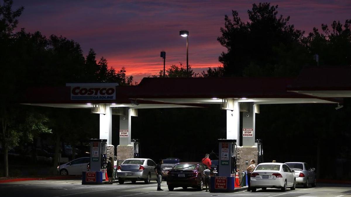 In this Wednesday, Sept. 30, 2015, photo, motorists get gas at a Costco station in Sacramento, Calif. Fuel experts, economists and consumer advocates appeared at a hearing of the Petroleum Market Advisory Committee, Monday, Feb. 8, 2016, to discuss why California gas prices are consistently higher than the national average.