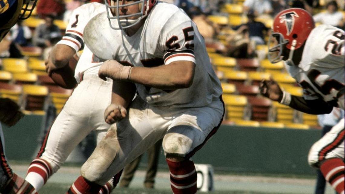 Atlanta Falcons tackle Len Gotshalk (65) blocks during a 31-0 loss to the Los Angeles Rams on September 23, 1973, at the Los Angeles Memorial Coliseum.