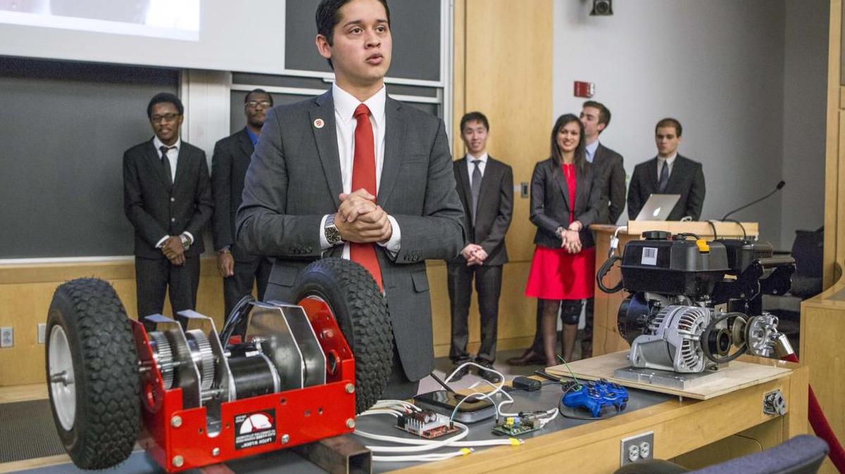 Harvard University junior Cesar Maeda explains a robotic snow blower in Cambridge, Mass. Eighteen juniors representing several engineering disciplines spent the fall semester inventing a robotic remote-control rooftop snowblower, a super-heated icicle cutter and a freeze-resistant doormat. The inventions grew out of last winter’s record snowfall, which stretched campus maintenance department workers to their limit and forced a campus shutdown for the first time since the Blizzard of ’78.