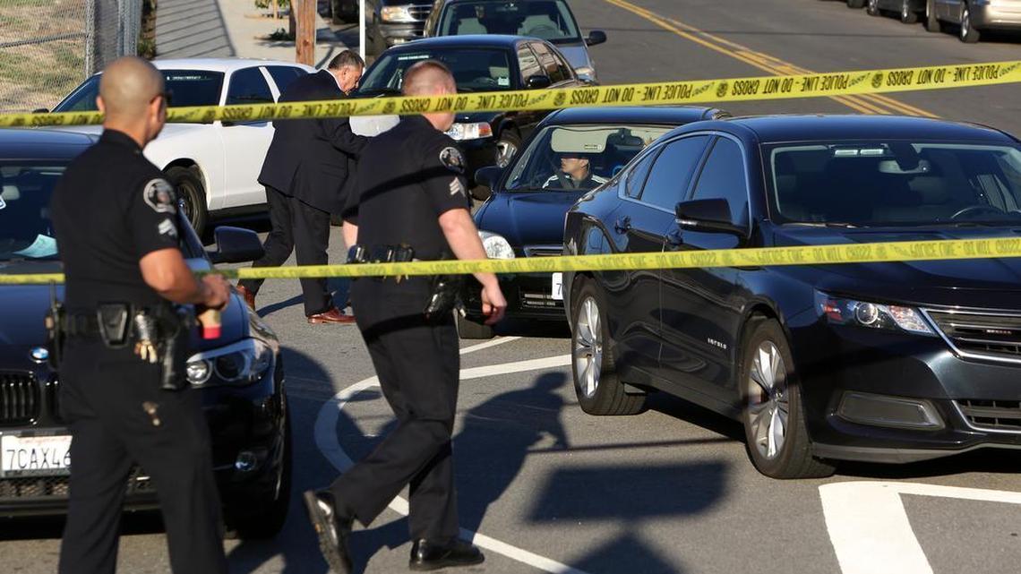 Police officers turn arriving parents and students away from a closed Edward Roybal High School in Los Angeles, on Tuesday morning, Dec. 15, 2015. All schools in the vast Los Angeles Unified School District, the nation's second largest, have been ordered closed due to an electronic threat Tuesday.