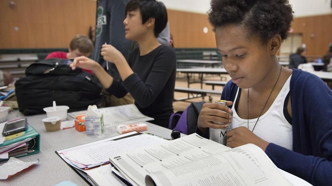 Jade Thomas, 15, a junior at George Washington Carver School of Arts and Science, goes over study material before she takes the PSAT test on Wednesday, Oct. 14, 2015, in Sacramento. “There were some people around who were struggling,” she said after the test. “There were tiny whispers like, ‘What does this mean?’”