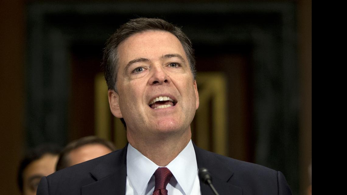 
FBI Director James Comey testifies during the Senate Judiciary Committee hearing on Capitol Hill in Washington on July 8, 2015. Comey says Dylann Roof, the gunman in the Charleston, S.C., church massacre, should not have been allowed to purchase the gun used in the attack and attributed the problem to incomplete and inaccurate paperwork related to an arrest of Roof weeks before the shooting.
