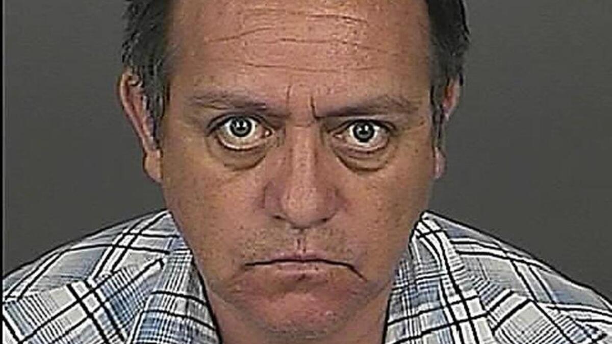 
Jason Martinez is seen in this Denver Police Department booking photo dated July 18, 2013. New Mexico's attorney general is launching an investigation into how the state's largest school district hired Martinez as a high-level administrator who faces child sex abuse charges in Colorado.
