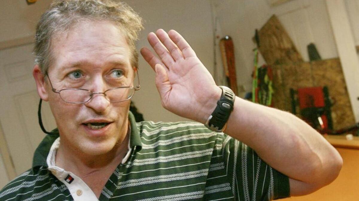 1984 Olympic downhill champion Bill Johnson points to the area on his head where doctors performed surgery following his March 2001 skiing accident in Big Mountain, Mont. Johnson was making a comeback when he went down in an event. He was in a coma for several weeks before he was brought to Portland. Johnson got his start learning to ski at age 7 at Bogus Basin Mountain Recreation Area in Boise.