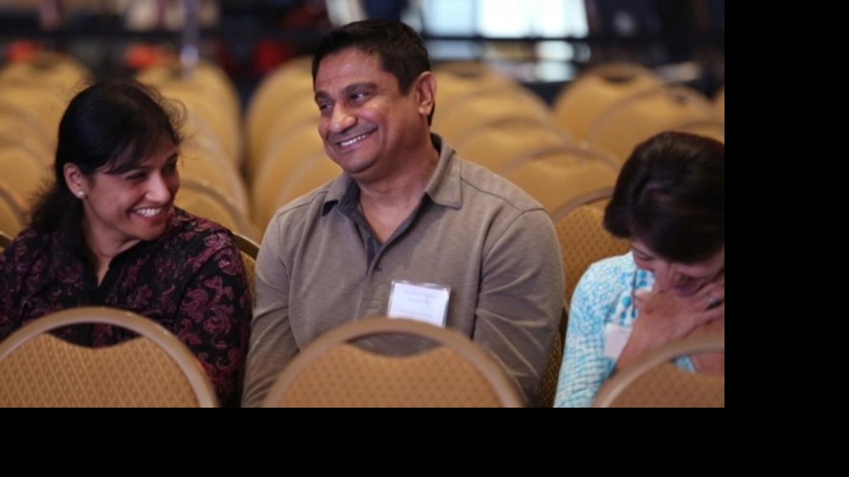 
Sandy, left, and Mirle Shivashankar, center, react with Vanya Shivashankar’s teacher Kathy Mencer after Vanya successfully spelled “pistachio” to advance to Round 3 at the 2015 Scripps National Spelling Bee. Before the round, Mirle Shivashankar explained that even for a family like theirs who have attended the event for nine years, the nerves never go away. “No matter how many times you do this,” he said.
