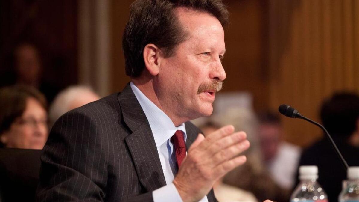 In this Nov. 17, 2015, photo, Dr. Robert Califf, President Barack Obama's nominee to lead the Food and Drug Administration, testifies on Capitol Hill in Washington.