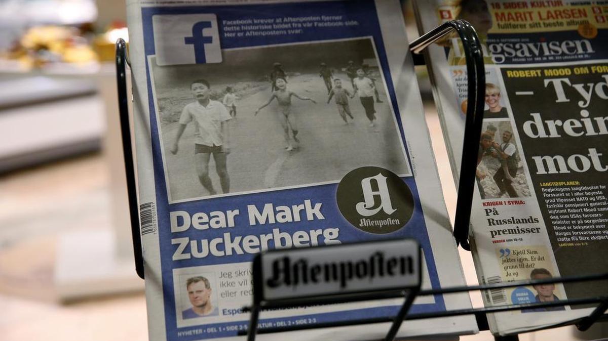The cover to Norway's largest circulation newspaper, Aftenposten, displayed in Oslo on Friday. Editor-in-chief and CEO, Espen Egil Hansen, wrote an open letter to founder and CEO of Facebook, Mark Zuckerberg, accusing him of threatening the freedom of speech and abusing power after deleting the iconic picture from the Vietnam war, taken by Associated Press photographer Nick Ut, of a young girl running from a napalm attack. The Pulitzer Prize-winning image by Nick Ut is at the center of a heated debate about freedom of speech in Norway after Facebook deleted it from a Norwegian author's page.