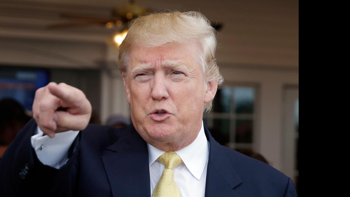 
Republican presidential candidate Donald Trump arrives to a fundraising event at a golf course in the Bronx borough of New York Monday.
