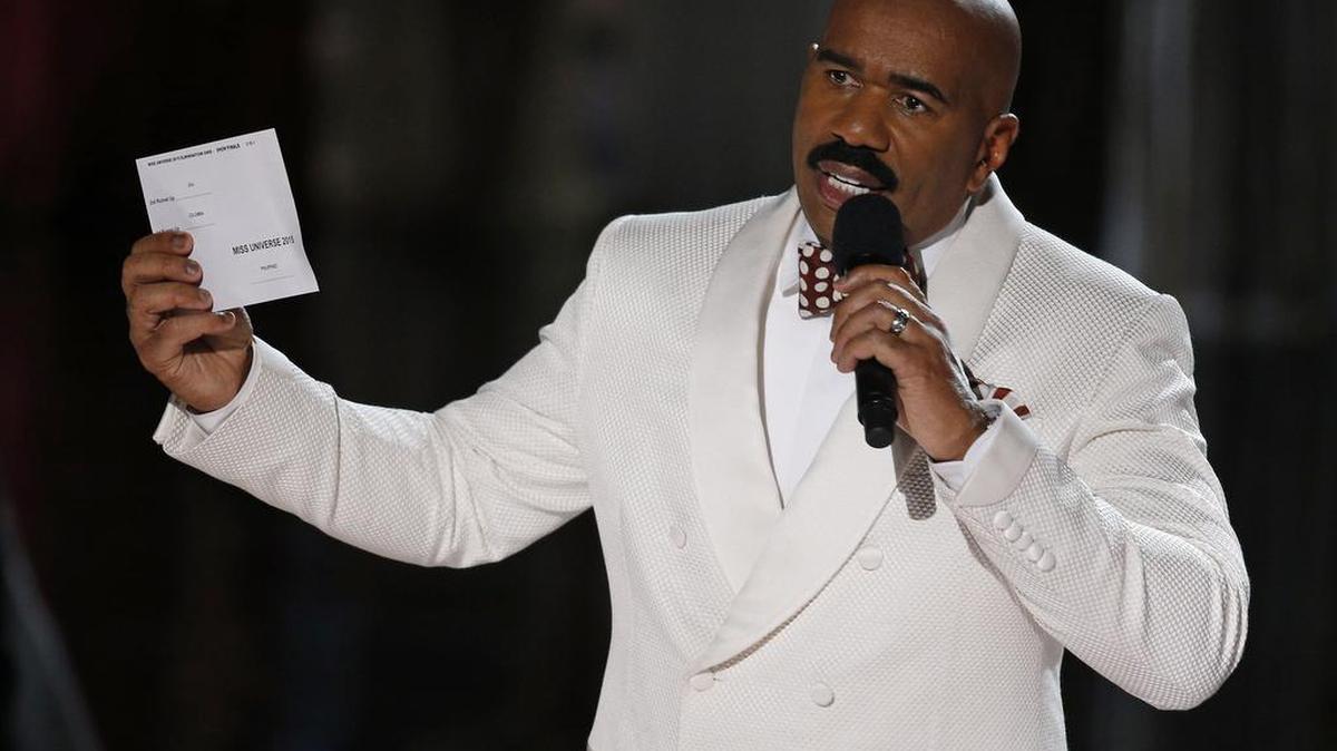 Steve Harvey holds up the card showing the winners after he incorrectly announced Miss Colombia Ariadna Gutierrez at the winner at the Miss Universe pageant Sunday, Dec. 20, 2015, in Las Vegas. According to the pageant, a misreading led the announcer to read Miss Colombia as the winner before they took it away and gave it to Miss Philippines Pia Alonzo Wurtzbach.