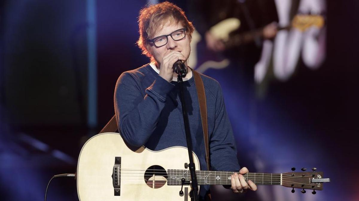 British singer Ed Sheeran performs during the Italian State RAI TV program "Che Tempo che Fa", in Milan, Italy, Sunday, March 12, 2017.
