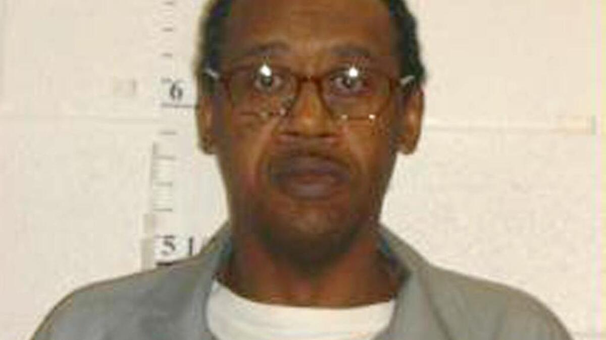 Ernest Johnson was convicted of killing three Columbia, Mo., convenience store workers with a claw hammer in 1994.