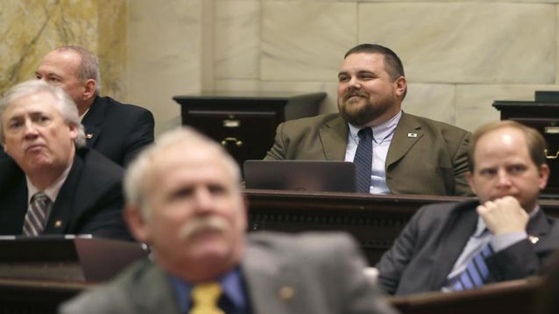 
Rep. Bob Ballinger, R-Hindsville, top right, smiles as the vote on a reworked religious freedom bill he presented passed in the House chamber at the Arkansas state Capitol in Little Rock, Ark., Thursday, April 2, 2015. 
