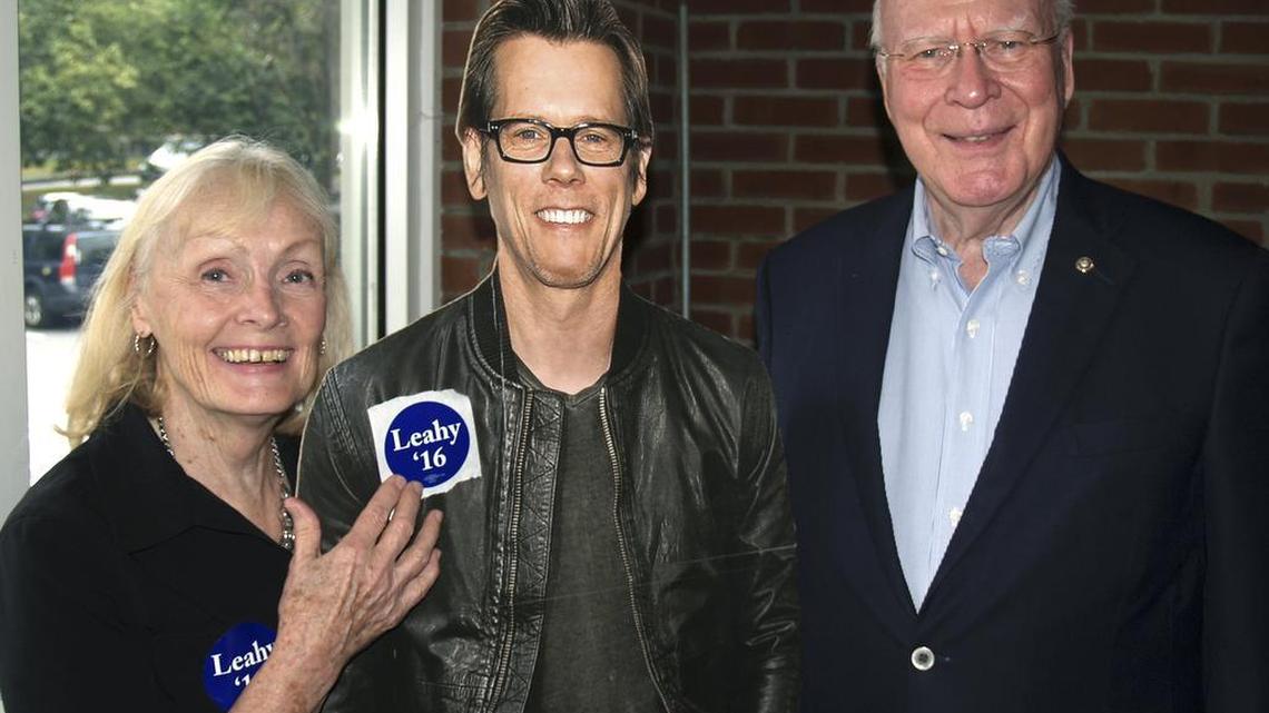 U.S. Sen. Patrick Leahy, right, and his wife Marcelle pose with a life-size cardboard photo of actor Kevin Bacon in Brattleboro, Vt. The Chamber launched a social media blitz in August inviting Bacon to its annual Baconfest, scheduled for Saturday, Sept. 17, but the actor won’t be able to make it because he’s filming a movie in Vancouver.