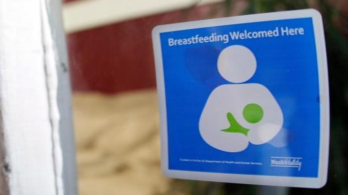 A decal reading "Breastfeeding Welcomed Here" is displayed on the door to a store in Nashville, Tenn. Congress on Wednesday gave final approval to a bill that would require the federal government to study the health risks that women face from taking medication while breast-feeding.