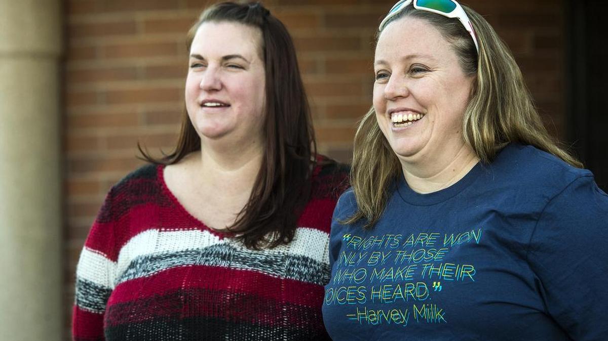 April Hoagland, left, and Beckie Peirce smile during a press conference outside of the Juvenile Court in Price, Utah on Friday, Nov. 13, 2015. A judge ordered a 9-month-old baby taken from the married couple’s home. He later reversed his order.