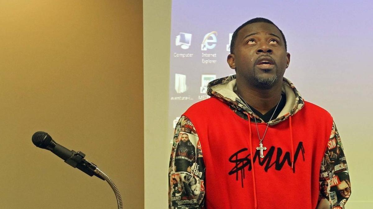 5000 Role Models of Excellence Project speaker Antwan Reeves thanks God before he gives his testimonial about being shot along with his cousin Stedman Bailey of the NFL’s St. Louis Rams, as part of "Life Matters... Stop Gun Violence" at Aventura Hospital and Medical Center on Thursday January 14, 2016