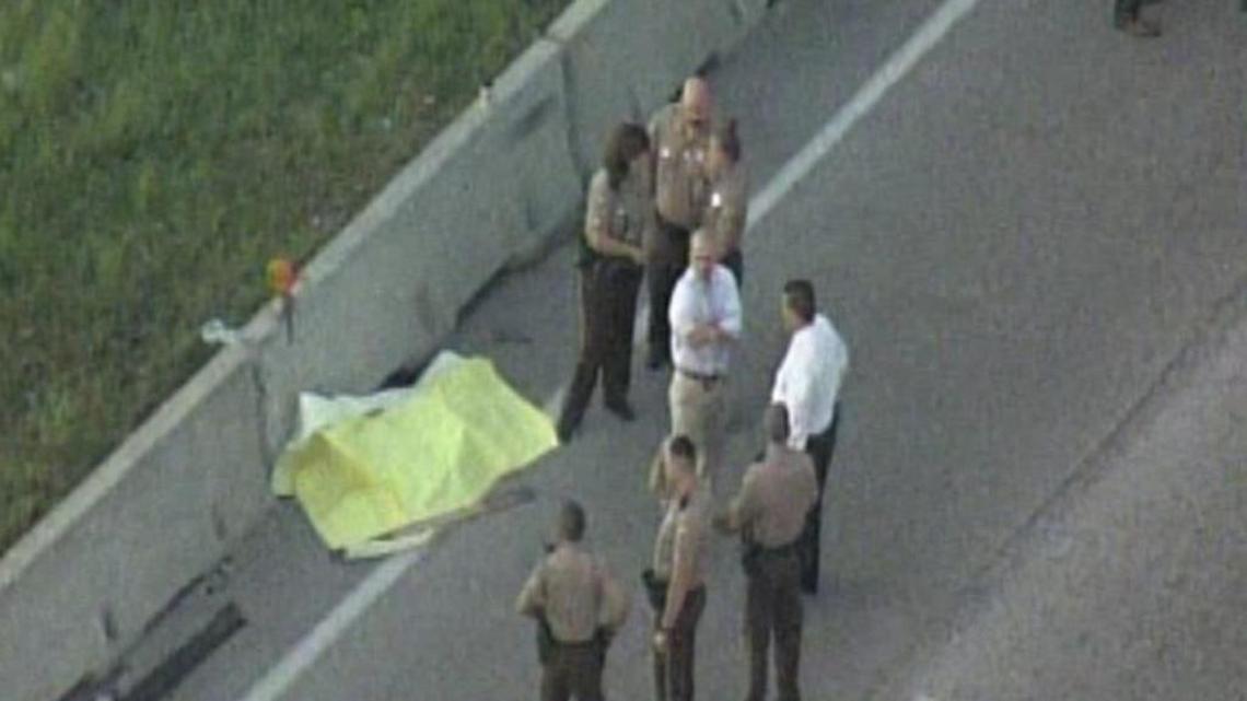 An investigation is underway after a woman's body was found on the side of the road.