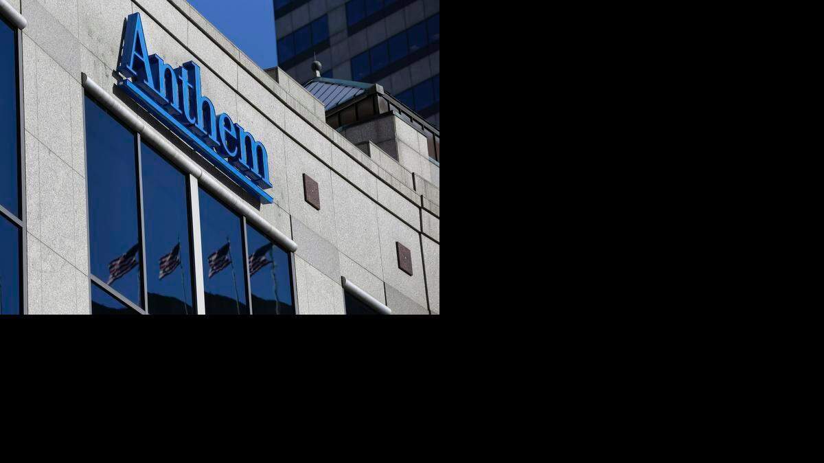 
In this Feb. 5, 2015 file photo, the Anthem logo hangs at the health insurer's corporate headquarters in Indianapolis. Insurers aren't required to encrypt consumers' data under a 1990s federal law that remains the foundation for health care privacy in the Internet age _ a striking omission in light of the cyberattack against Anthem, the nation's second-largest health insurer. 
