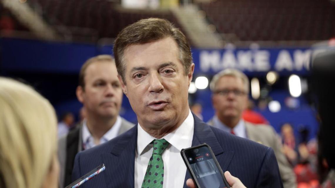 Trump Campaign Chairman Paul Manafort talks to reporters on the floor of the Republican National Convention at Quicken Loans Arena, Sunday, July 17, 2016, in Cleveland.