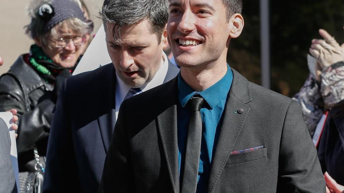 David Robert Daleiden, one of the two anti-abortion activists indicted last week, speaks to supporters outside the Harris County Criminal Courthouse after turning himself in to authorities Thursday in Houston. Daleiden and Sandra Merritt are charged with tampering with a governmental record, a felony punishable by up to 20 years in prison.