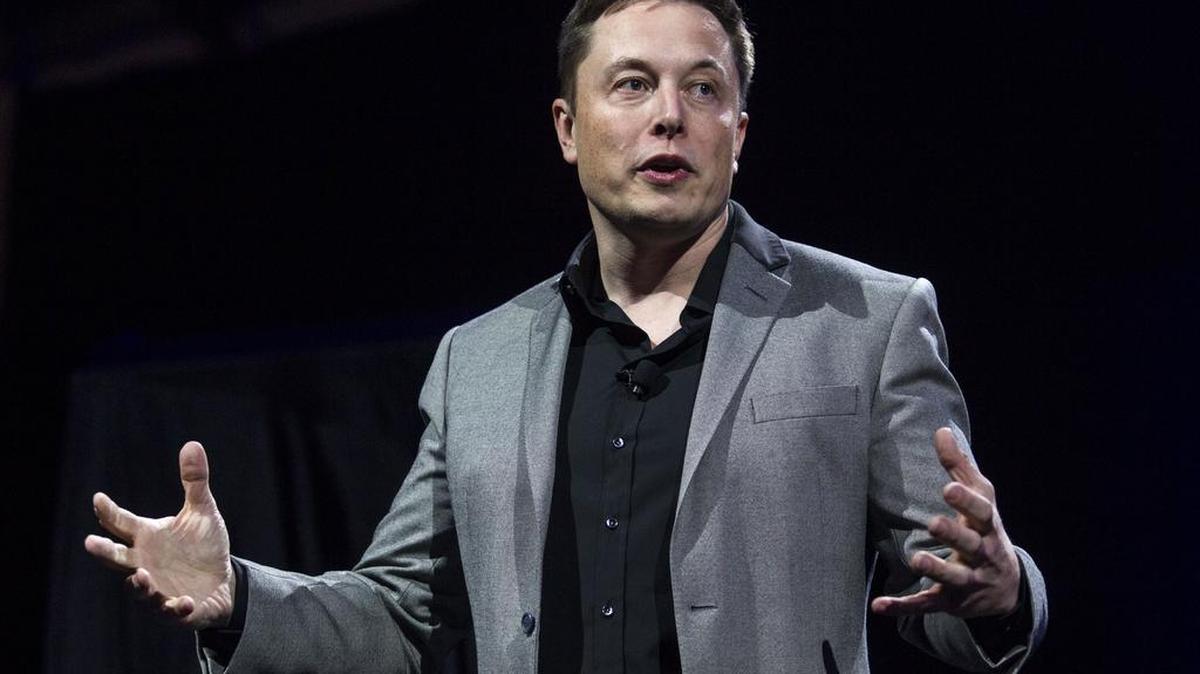 FILE - In this April 30, 2015, file photo, Tesla Motors CEO Elon Musk unveils the company's newest products, in Hawthorne, Calif.