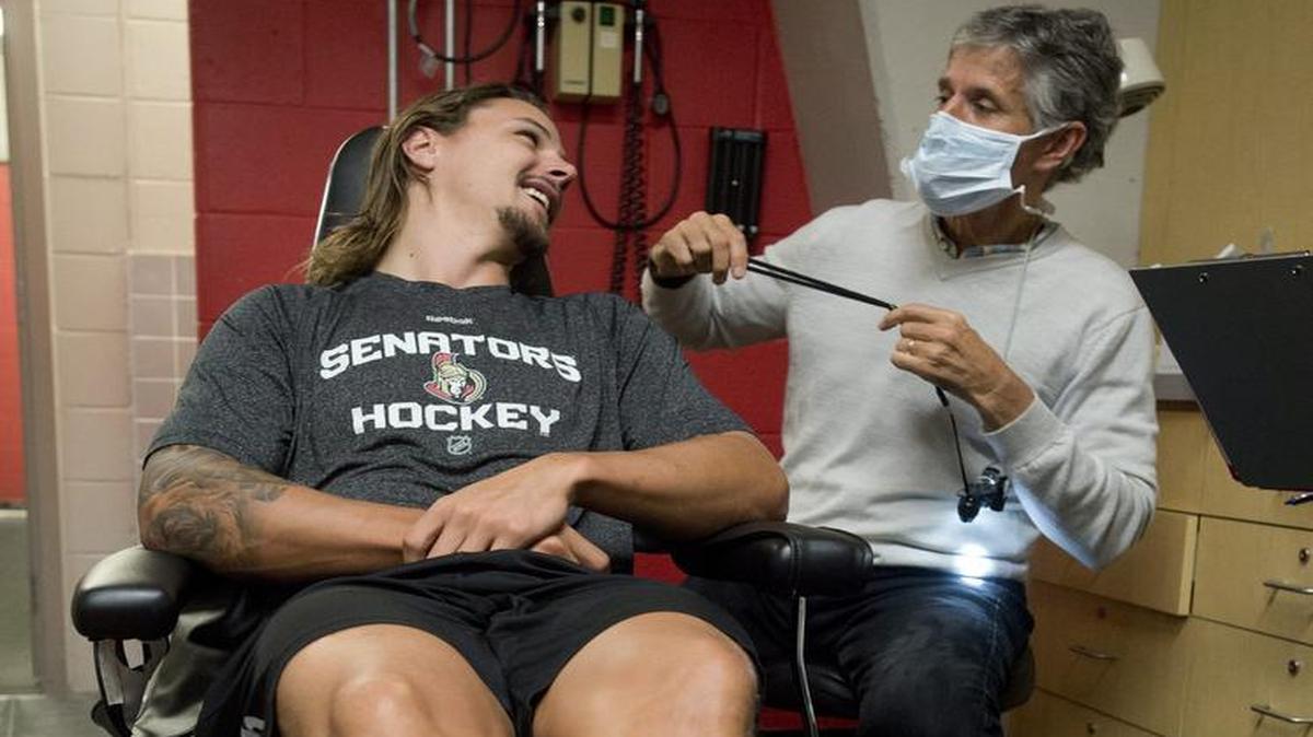 
Ottawa Senator Erik Karlsson speaks with the team dentist during a checkup on the first the first day of NHL hockey training camp, Thursday, Sept. 17, 2015, in Ottawa. A 2013 report by the U.S. Geological Survey said dental mercury fillings now account for 35 percent to 57 percent of the nation’s end-use mercury products.

