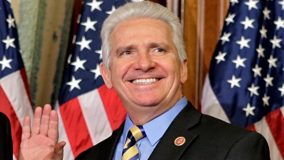 In this file photo, Rep. Jim Costa, D-Calif., poses for a re-creation of his swearing in on Capitol Hill in Washington as the 113th Congress began. Jan. 3, 2013