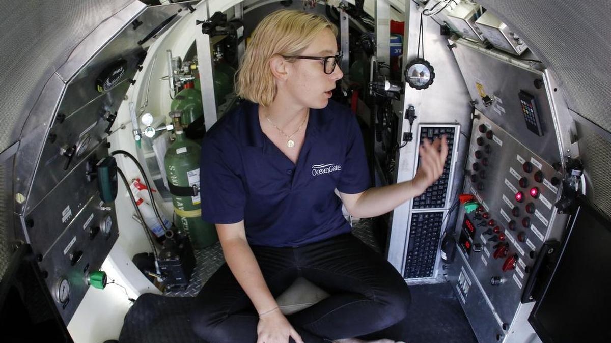 Isabel Johnson, a submarine pilot in training, sits inside the submersible OceanGate Gyclops 1 during a presentation of findings on Monday in Boston, after its undersea exploration of the wreck of the ocean liner SS Andrea Doria in the Atlantic Ocean near Nantucket. The ship went down after a collision nearly 60 years ago, killing 46.