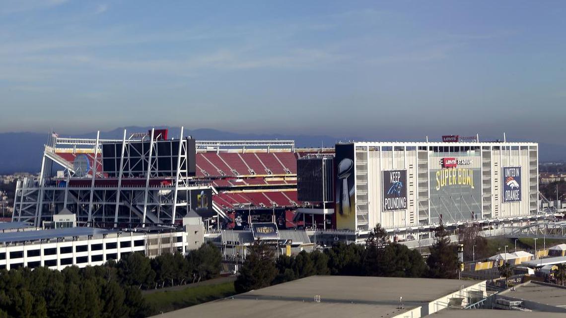 Banners for the Denver Broncos and Carolina Panthers hang outside Levi’s Stadium in advance of Sunday’s NFL Super Bowl 50 football game Saturday, Feb. 6, 2016, in Santa Clara, Calif.